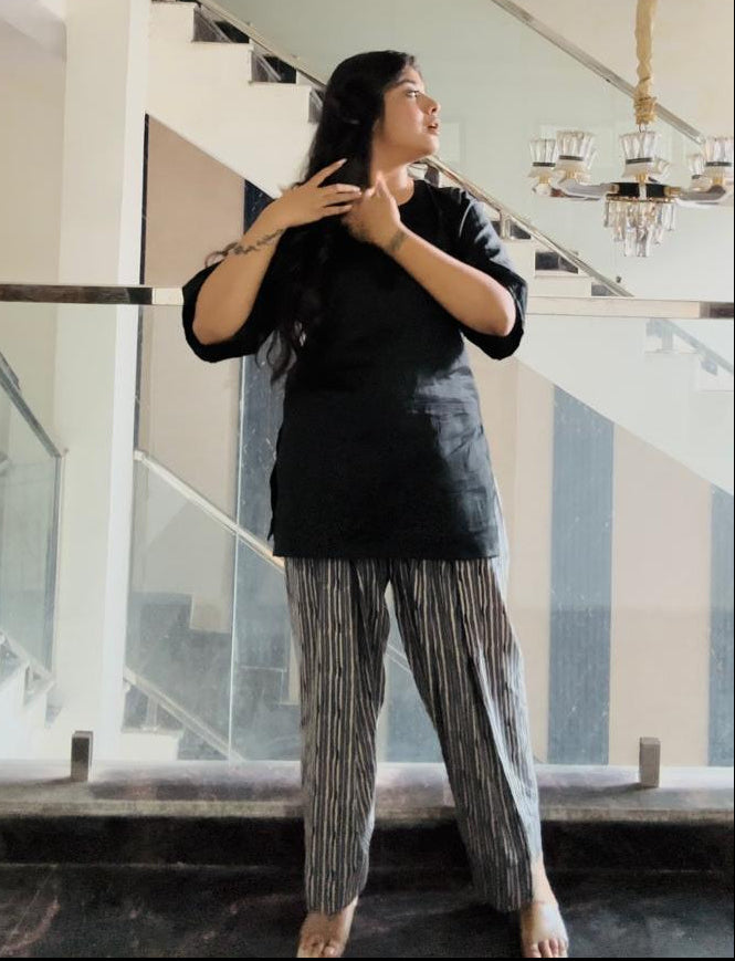 black kurti with striped farshi salwar
