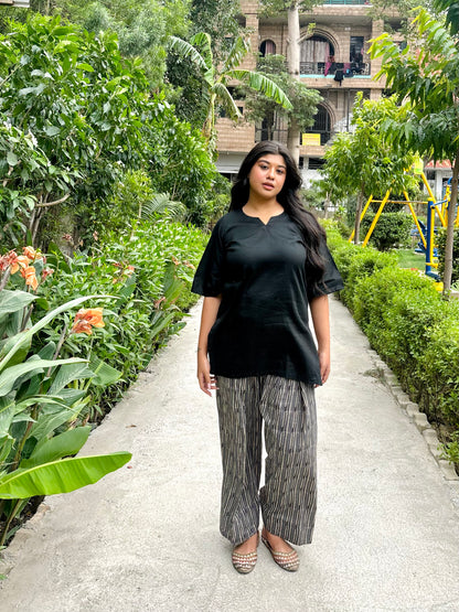 black kurti with striped farshi salwar