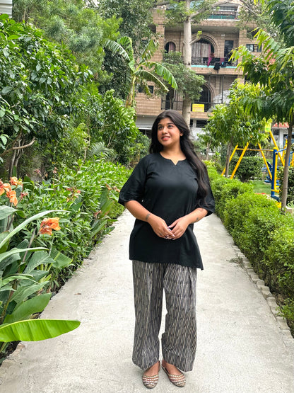 black kurti with striped farshi salwar