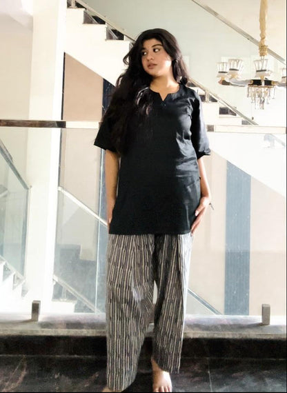 black kurti with striped farshi salwar